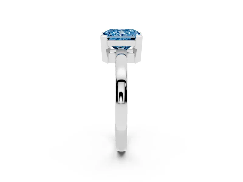 Fancy Blue Radiant Cut Diamond Solitaire Ring Set in Silver with Prong Head and Smooth Polished Band