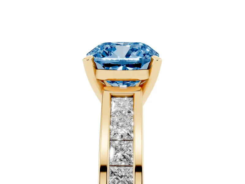 Fancy Blue Cushion Cut Diamond Solitaire Ring Set in Yellow gold with Channel-Set Band and Prong Setting