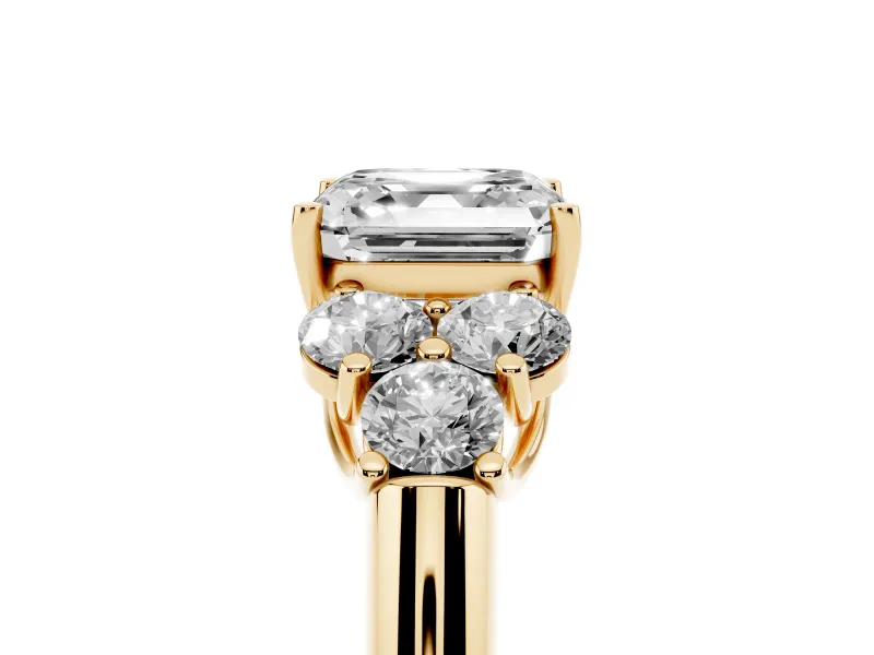 Asscher Cut Diamond Cluster Ring Set in Yellow gold with Round Accent Stones and Prong Setting on a Plain Band