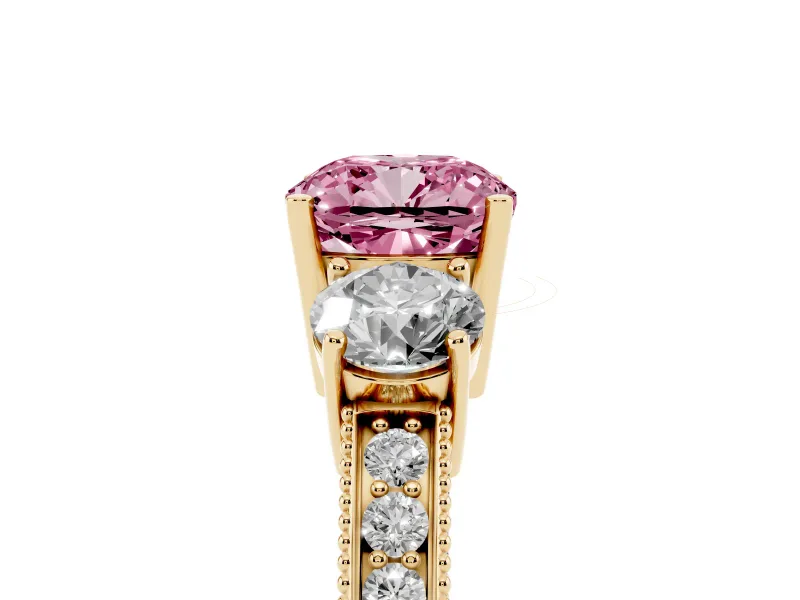 Fancy Pink Cushion Cut Diamond Three-Stone Ring Set in Yellow gold with Round Side Stones and Pavé Band