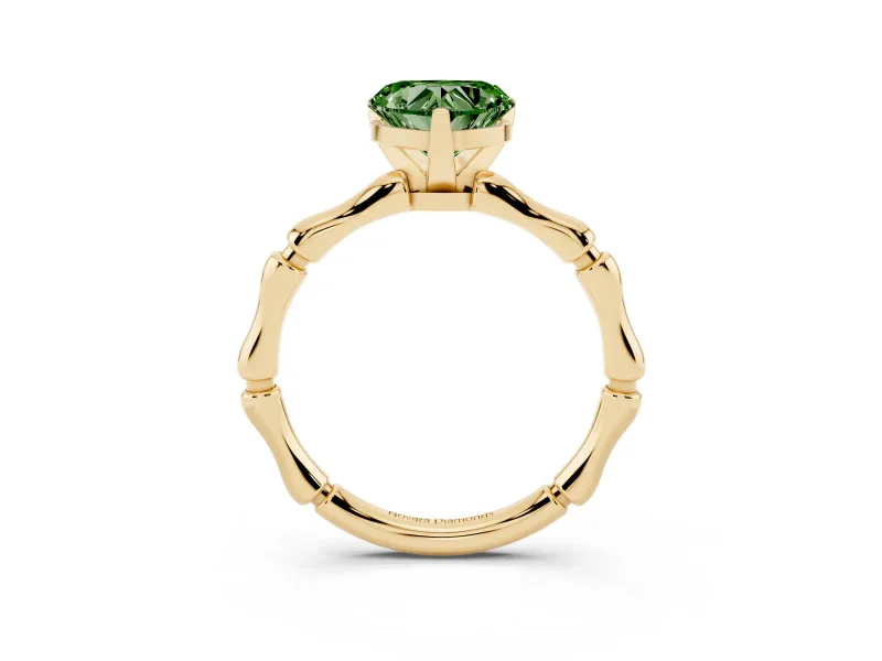 Fancy Green Heart Cut Diamond Solitaire Ring Set in Yellow gold with Bamboo Band and Prong Setting