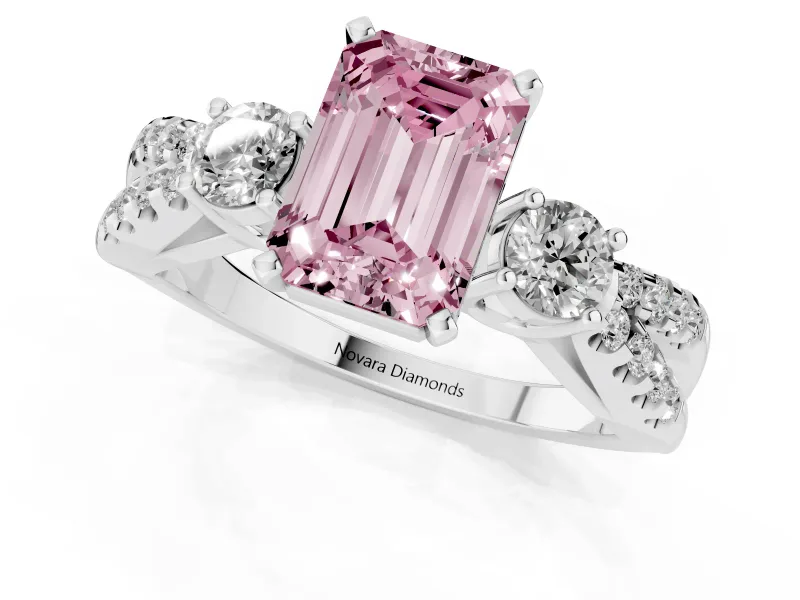 Fancy Pink Emerald Cut Diamond Three-Stone Ring Set in Platinum with Pavé Split Shank and Prong Setting