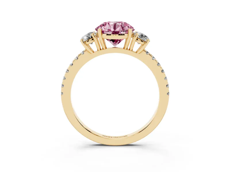 Fancy Pink Round Cut Diamond Three-Stone Ring Set in Yellow gold with Pavé Band and Graduated Sides