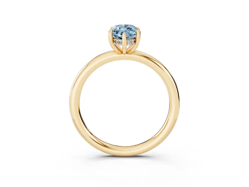 Fancy Blue Marquise Cut Diamond Solitaire Ring Set in Yellow gold with Thin Band and Prong Setting