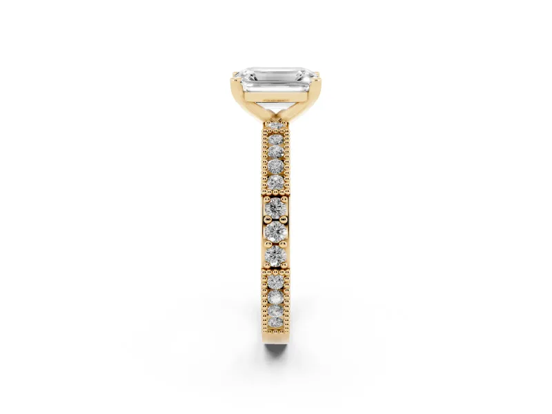 Emerald Cut Diamond Solitaire Ring Set in Yellow gold with Slim Pavé Band and Prong Setting