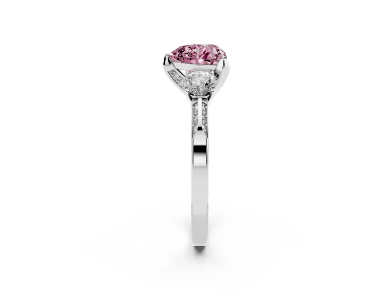 Fancy Pink Heart Cut Diamond Three-Stone Ring Set in Platinum with Pavé Band and Smaller Side Stones