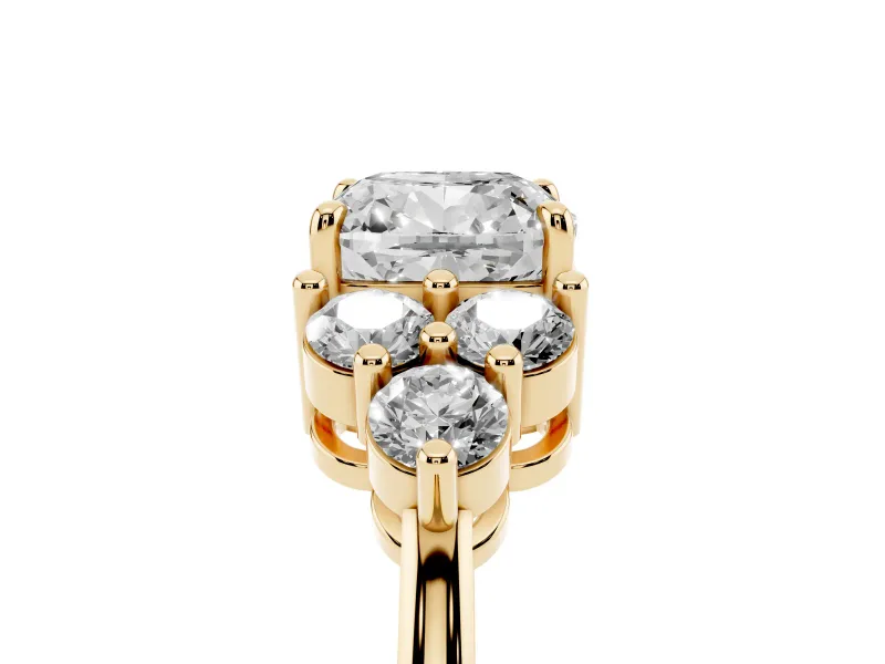 Cushion Cut Diamond Solitaire Ring Set in Yellow gold with Cluster Accents on Each Side