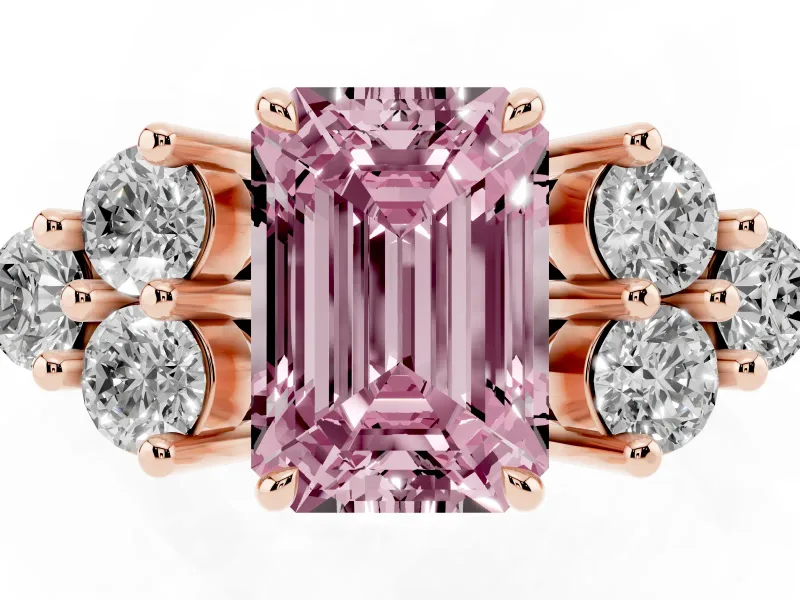Fancy Pink Emerald Cut Diamond Solitaire Ring Set in Rose gold with Cluster Accents on Each Side