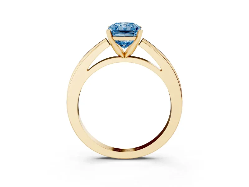 Fancy Blue Radiant Cut Diamond Solitaire Ring Set in Yellow gold with Prong Setting and Classic Band