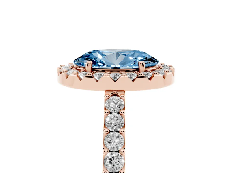 Fancy Blue Oval Cut Diamond Halo Pavé Solitaire Ring Set in Rose gold with Prong-Set Center Stone