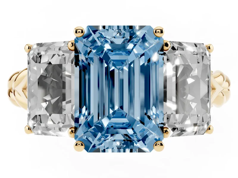 Fancy Blue Emerald Cut Diamond Three-Stone Ring Set in Yellow gold with Braided Band