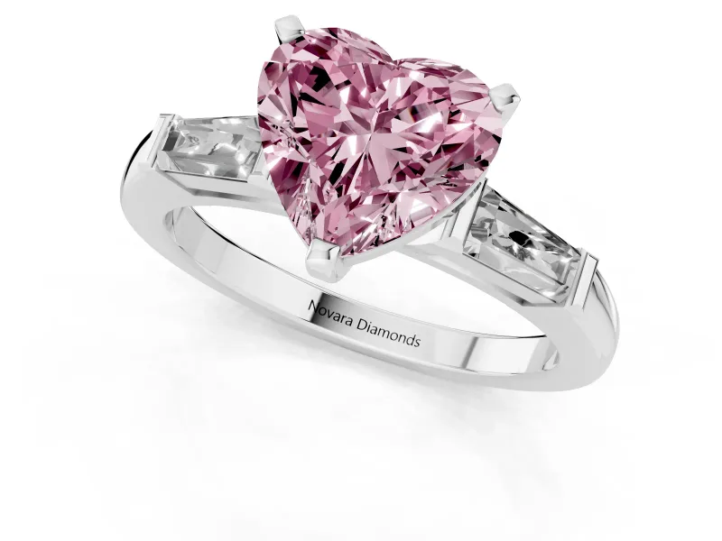 Fancy Pink Heart Cut Diamond Solitaire Ring Set in Silver with Tapered Baguette Side Stones and Prong Setting