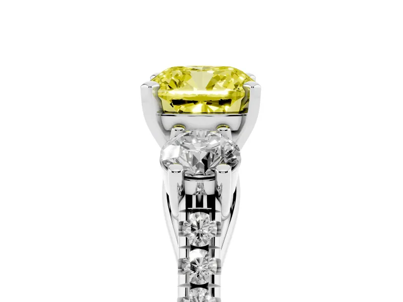 Fancy Yellow Three-Stone Cushion Cut Diamond Pavé Band Ring Set in Platinum with Prong-Set Trio