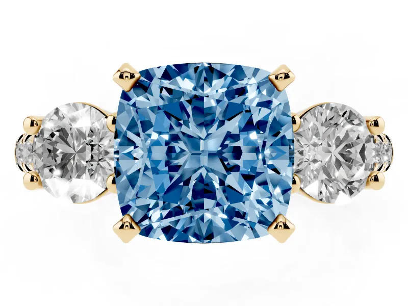 Fancy Blue Three-Stone Cushion Cut Diamond Pavé Band Ring Set in Yellow gold with Prong-Set Trio