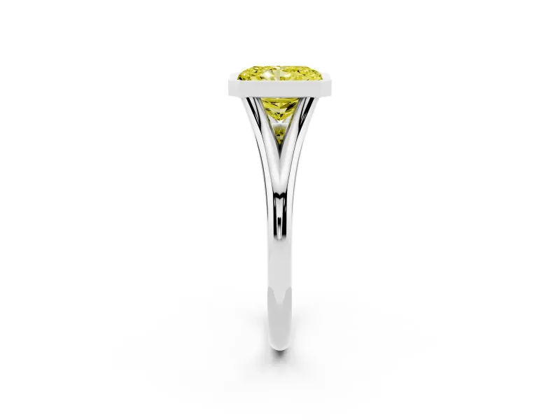 Fancy Yellow Bezel Set Radiant Cut Diamond Solitaire Ring Set in Platinum with Tapered Band