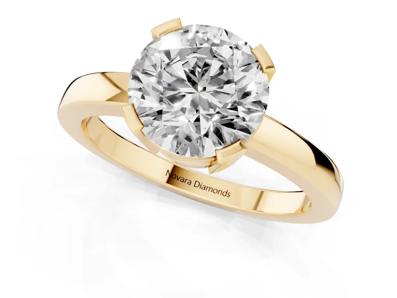 Round Cut Diamond Solitaire Ring Set in Yellow gold with Prong Head and Smooth Polished Band