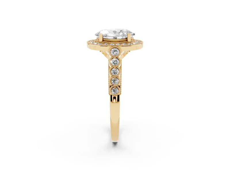 Oval Cut Diamond Milgrain Halo Solitaire Ring Set in Yellow gold with Bezel Set Side Stones and Pavé Band