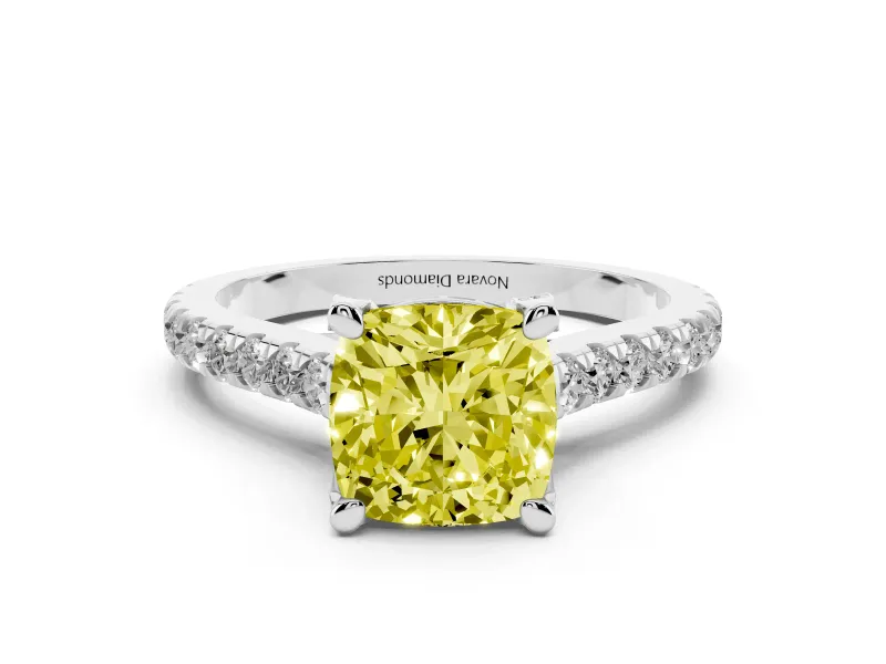 Fancy Yellow Cushion Cut Diamond Solitaire Ring Set in Platinum with Brilliant Pavé Band and Prong Setting