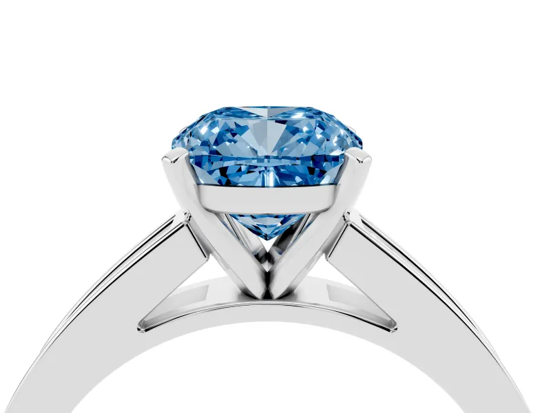 Fancy Blue Cushion Cut Diamond Solitaire Ring Set in Platinum with Channel-Set Band and Prong Setting