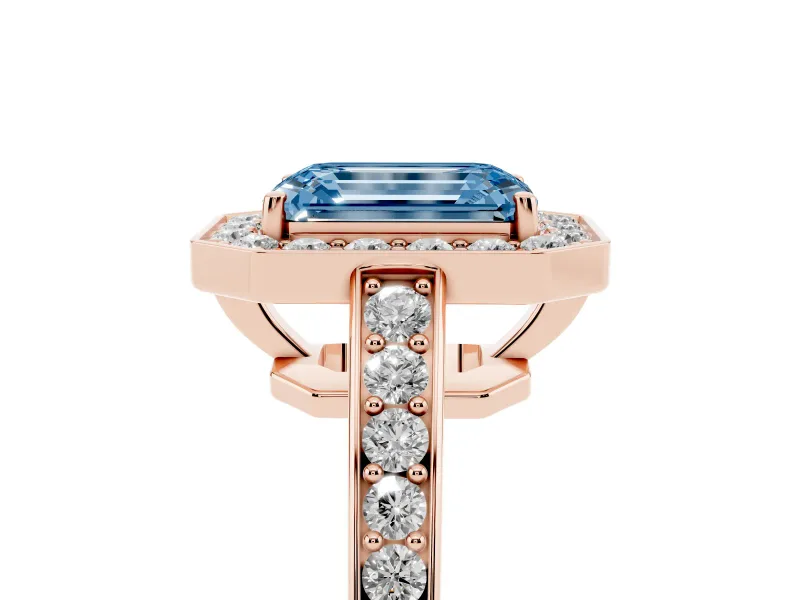 Fancy Blue Emerald Cut Diamond Halo Pavé Engagement Ring Set in Rose gold with Bezel Setting