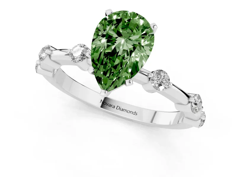 Fancy Green Pear Cut Diamond Solitaire Ring Set in White gold with Bezel Set Side Stones and Prong Setting