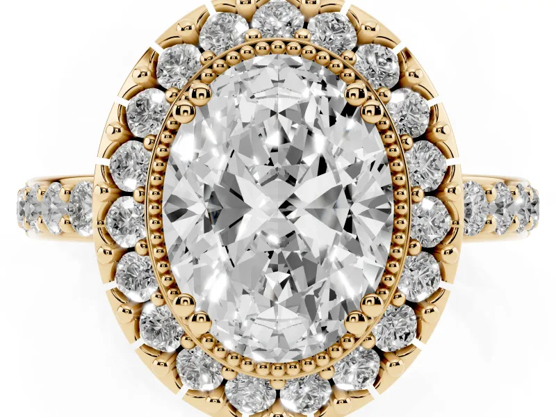 Oval Cut Diamond Halo Ring Set in Yellow gold with Pavé Shank and Prong Setting