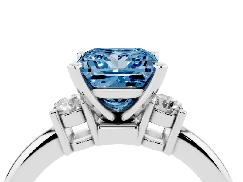 Fancy Blue Three-Stone Princess Cut Diamond Ring Set in White gold with Prong Setting and Plain Band