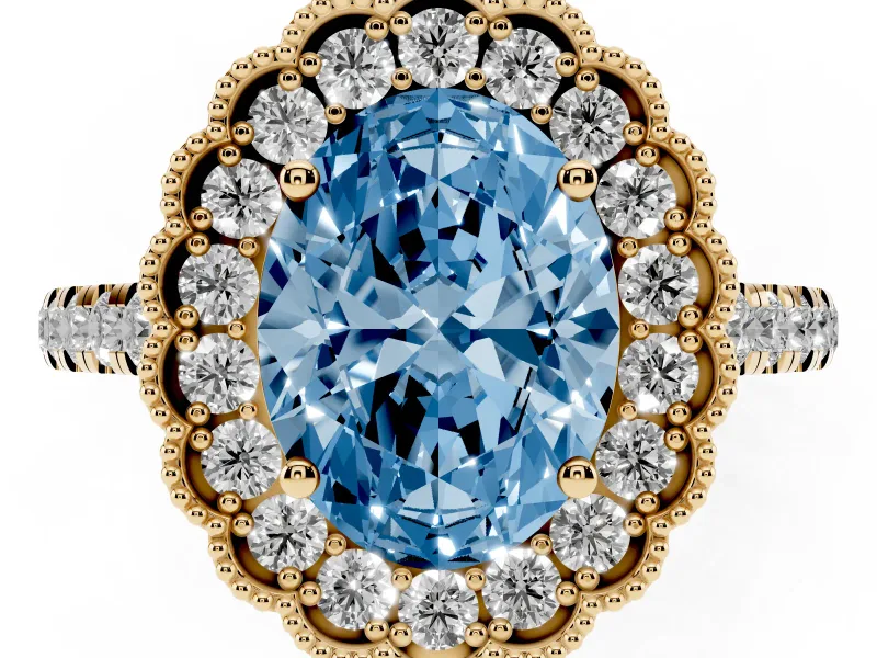 Fancy Blue Oval Cut Diamond Milgrain Floral Halo Engagement Ring Set in Yellow gold with Pavé Band
