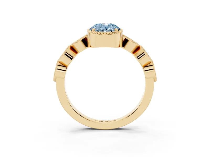 Fancy Blue Oval Cut Diamond Vintage-Inspired Milgrain Ring Set in Yellow gold with Marquise Stations of Round Accents