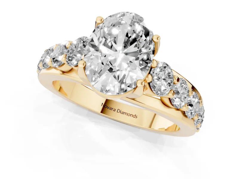 Oval Cut Diamond Pavé Engagement Ring Set in Yellow gold with Prong Setting