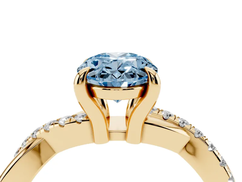 Fancy Blue Oval Cut Diamond Twist Band Solitaire Set in Yellow gold with Pavé Accents and Prong Setting
