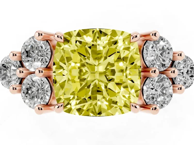 Fancy Yellow Cushion Cut Diamond Solitaire Ring Set in Rose gold with Cluster Accents on Each Side