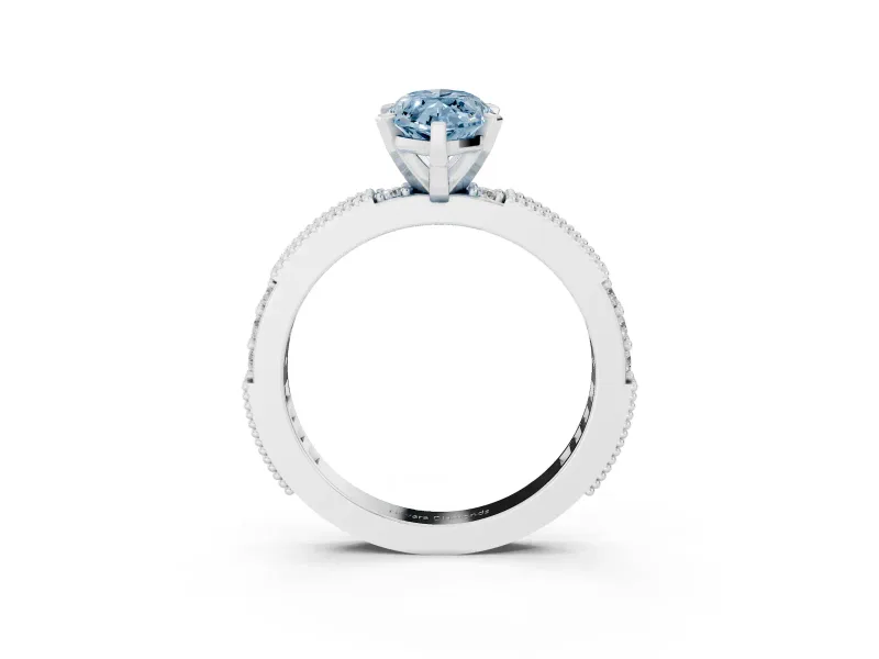 Fancy Blue Marquise Cut Diamond Solitaire Ring Set in Silver with Slim Pavé Band and Prong Setting