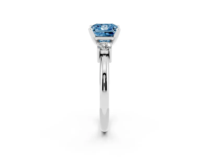 Fancy Blue Three-Stone Princess Cut Diamond Ring Set in Platinum with Prong Setting and Plain Band