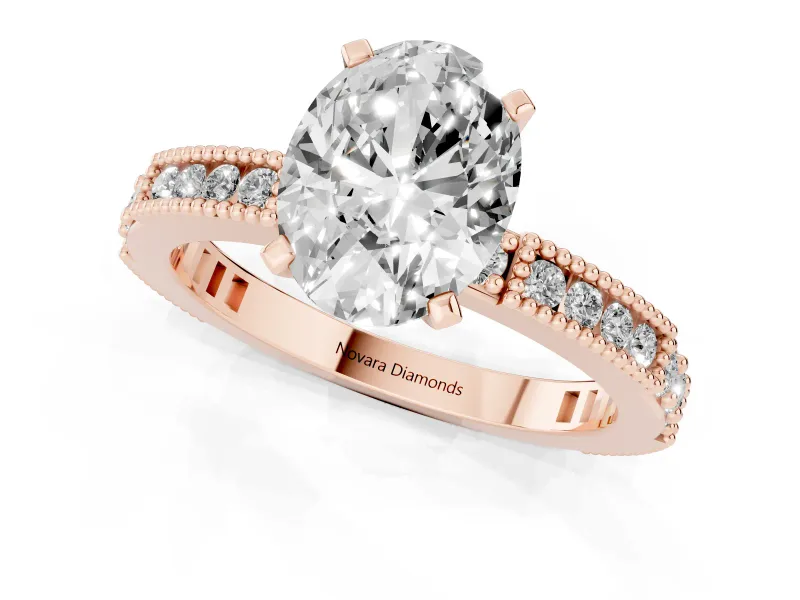 Oval Cut Diamond Solitaire Ring Set in Rose gold with Slim Pavé Band and Prong Setting
