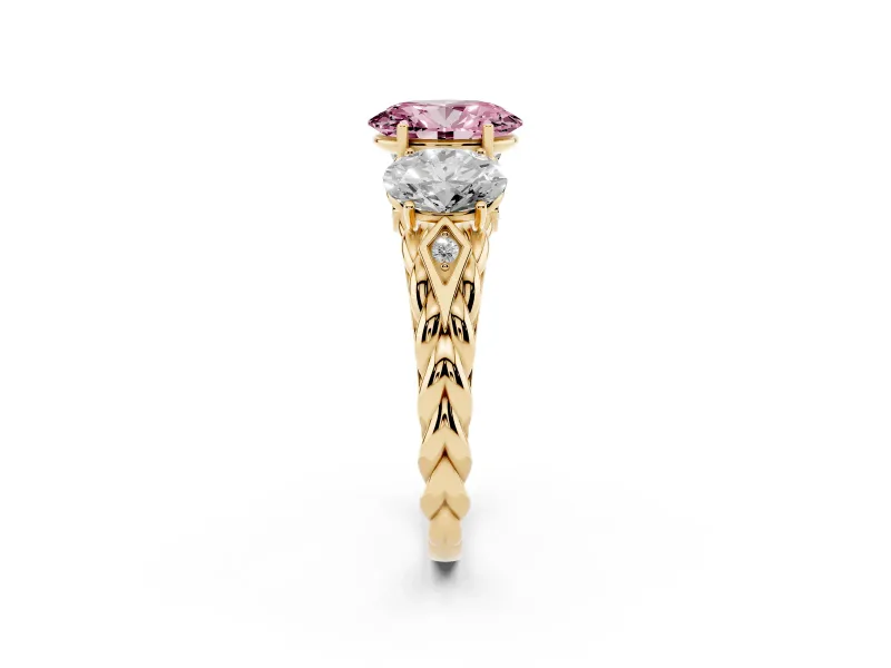 Fancy Pink Oval Cut Diamond Three-Stone Ring Set in Yellow gold with Braided Band