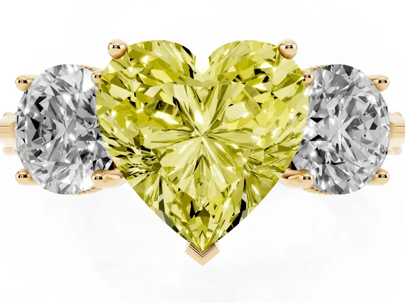Fancy Yellow Heart Cut Diamond Three-Stone Ring Set in Yellow gold with Milgrain Band