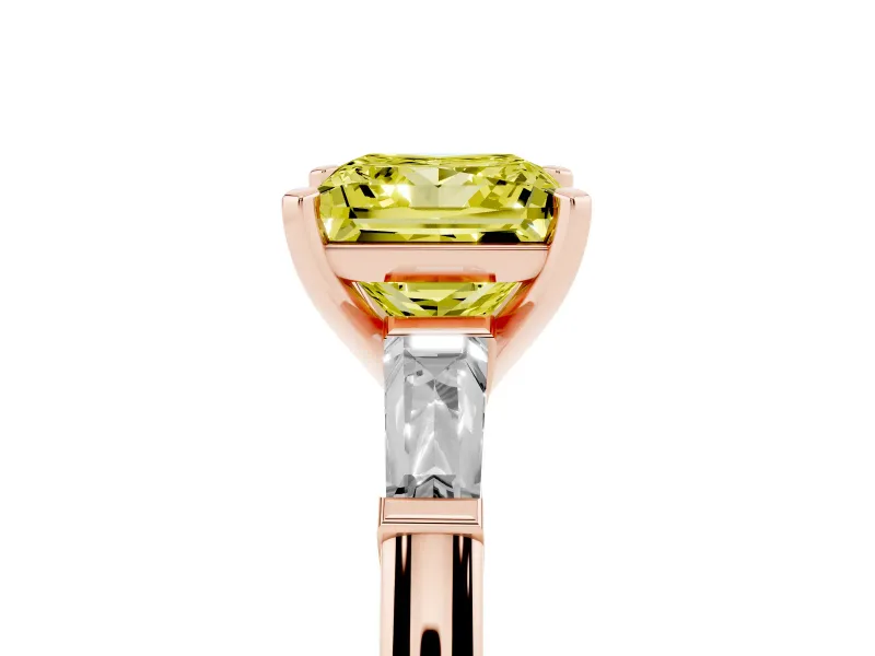 Fancy Yellow Princess Cut Diamond Solitaire Ring Set in Rose gold with Tapered Baguette Side Stones and Prong Setting