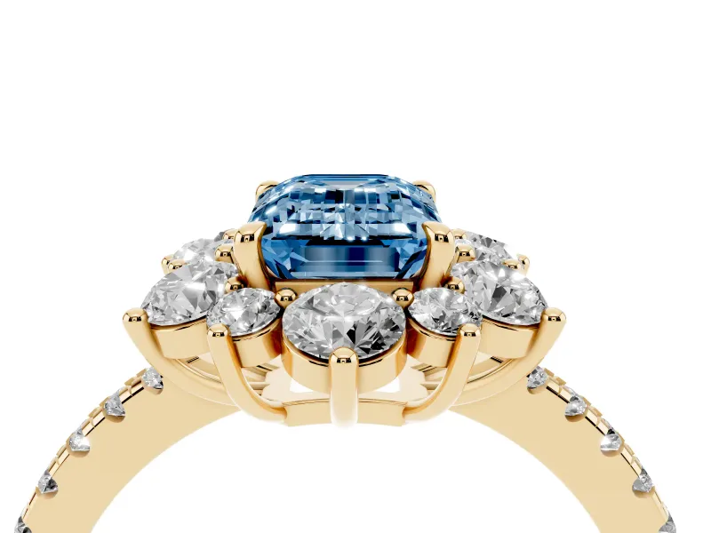 Fancy Blue Emerald Cut Diamond Floral Halo Ring Set in Yellow gold with Round Pavé Band and Prong Setting
