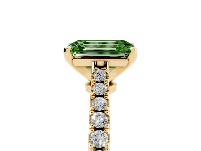 Fancy Green Emerald Cut Diamond Solitaire Engagement Ring Set in Yellow gold with Delicate Pavé Band and Prong Setting