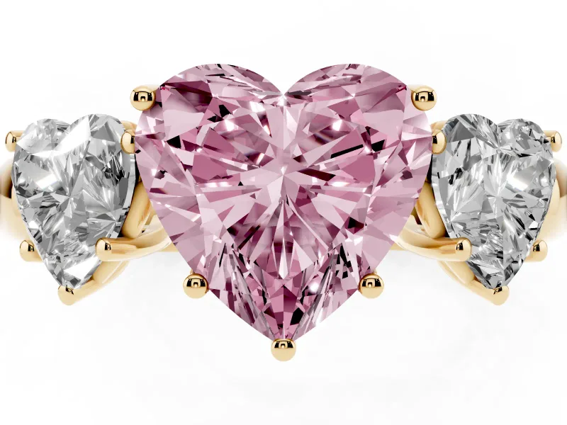 Fancy Pink Heart Cut Diamond Three-Stone Ring Set in Yellow gold with Bold Center and Classic Band