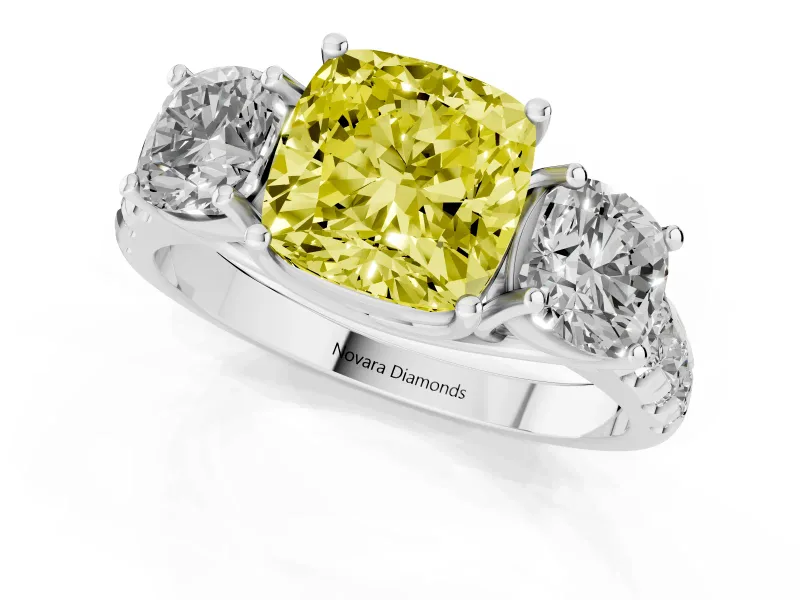 Fancy Yellow Cushion Cut Diamond Three-Stone Ring Set in Silver with Pavé Band