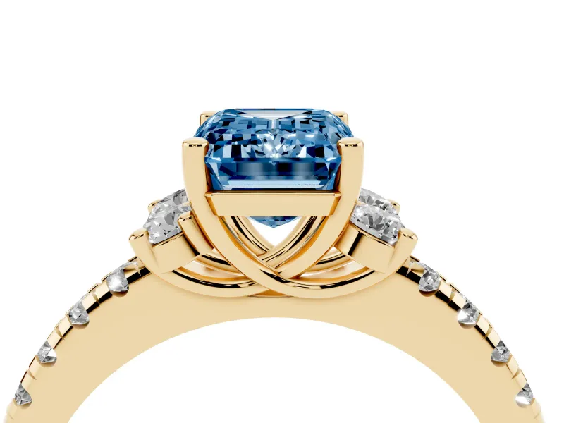 Emerald Cut Side Stone Engagement Ring Setting for a Fancy Blue Lab-Grown Diamond | Pave Band | Yellow Gold