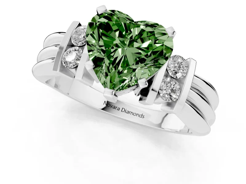 Fancy Green Three-Stone Heart Cut Diamond Channel Set Ring Set in Platinum with Bar Prongs