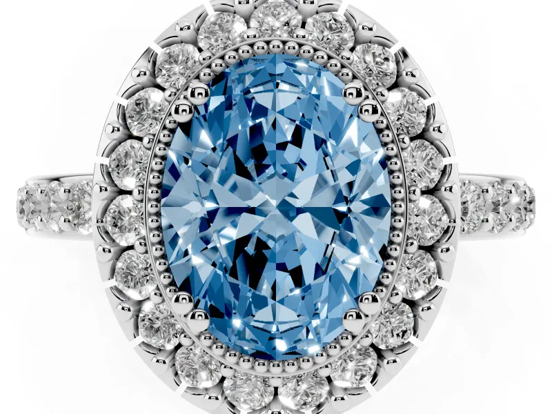 Fancy Blue Oval Cut Diamond Halo Ring Set in Silver with Pavé Shank and Prong Setting