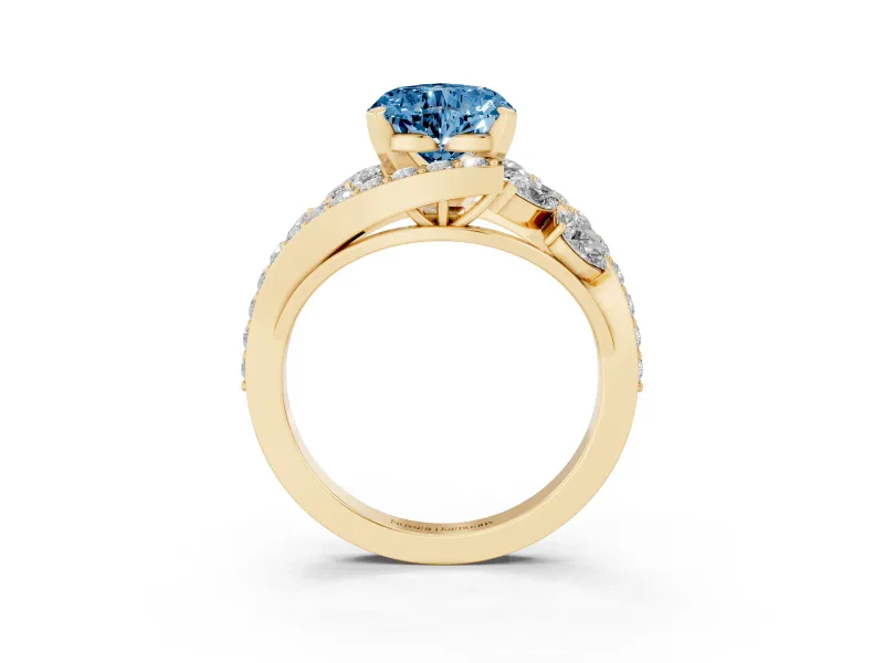 Fancy Blue Heart Cut Diamond Halo Ring Set in Yellow gold with Marquise and Pavé Band in Prong Setting