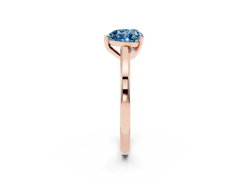 Fancy Blue Heart Cut Diamond Solitaire Ring Set in Rose gold with Prong Setting and Classic Band