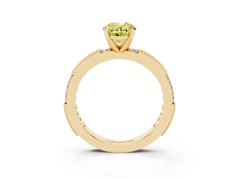 Fancy Yellow Oval Cut Diamond Solitaire Ring Set in Yellow gold with Slim Pavé Band and Prong Setting