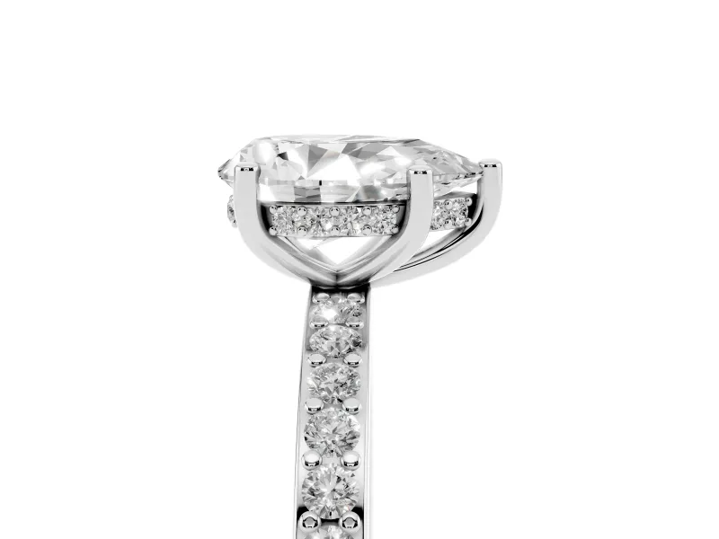 Pear Cut Diamond Pavé Band Ring Set in Platinum with Prong-Set Center Stone