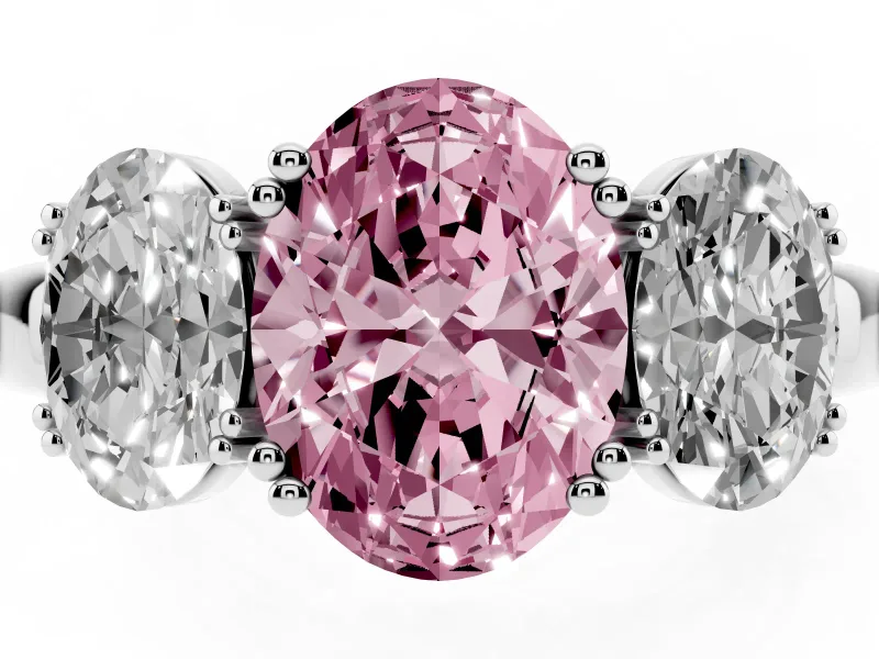 Fancy Pink Oval Cut Diamond Three-Stone Ring Set in Platinum with Polished Band and Prong Setting